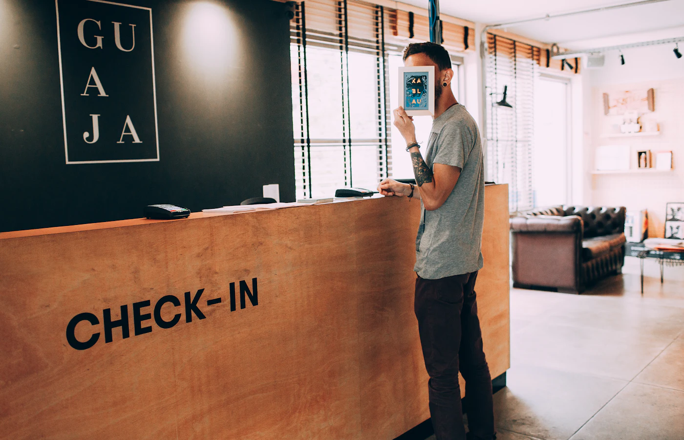 An office reception counter, the point where visitors sign in.